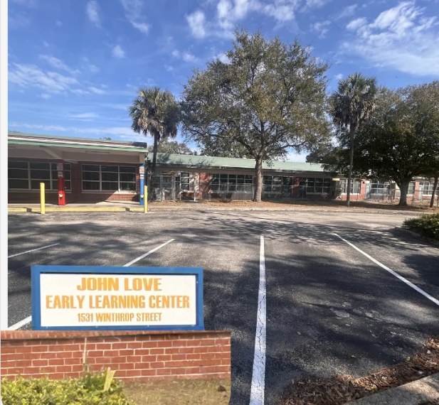 John Love Early Learning Center campus exterior and parking area