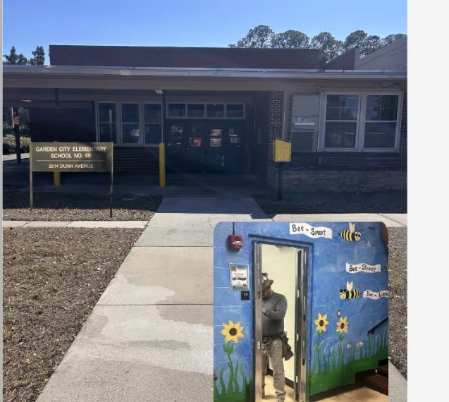 Garden City Elementary School entrance with school sign and walkway